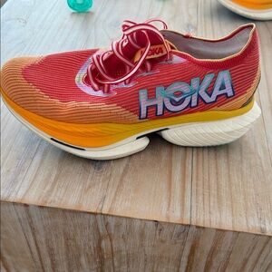 Hoka Red and Orange Athletic Shoe
